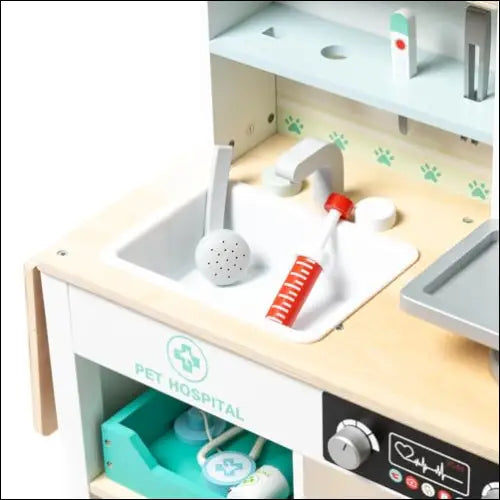 Centro Veterinario de Madera Konner con sink, herramientas médicas y compartimentos