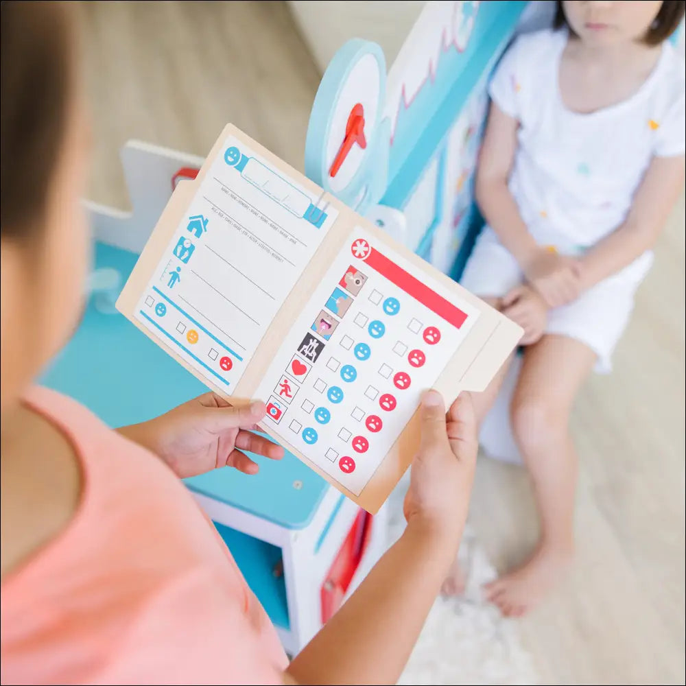 Tablero de recompensas colorido del Consultorio Médico de Melissa & Doug